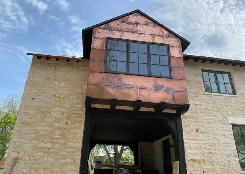 Copper metal panel facade on a stone building for Metal Roof Coating in Manassas Park