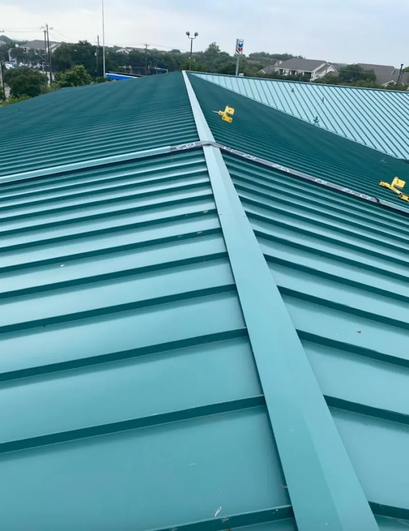 Green commercial metal roof ridge and valley for Metal Roof Repair in Manassas Park